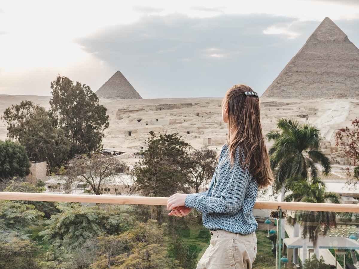 Woman Admiring Pyraminds of Giza